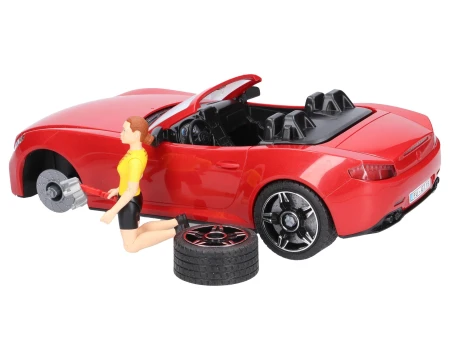 pol_pl_Bruder-03485-Auto-Roadster-czerwone-z-figurka-kolarki-i-rowerem-45681_4.jpg